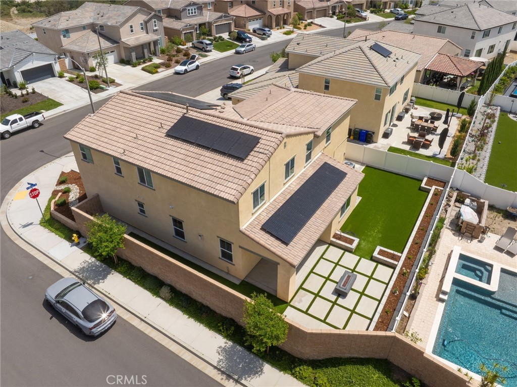 2414 Crater Avenue Rialto, CA 92377 - Photo 39 of 50 an aerial view of a house with a swimming pool