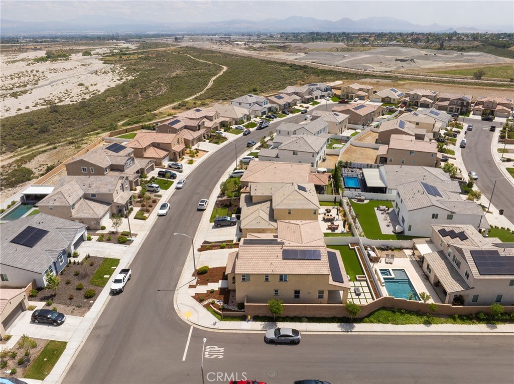 2414 Crater Avenue Rialto, CA 92377 - Photo 46 of 50 an aerial view of residential houses with outdoor space