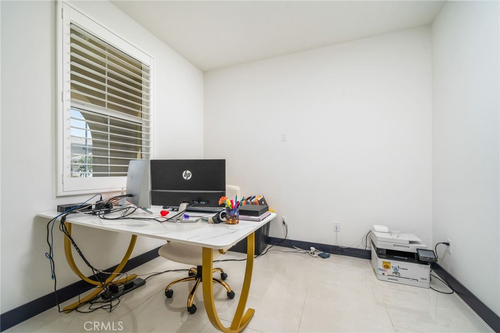 2414 Crater Avenue Rialto, CA 92377 - Photo 6 of 50 a view of a workspace with furniture