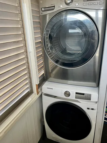 a utility room with washer and dryer