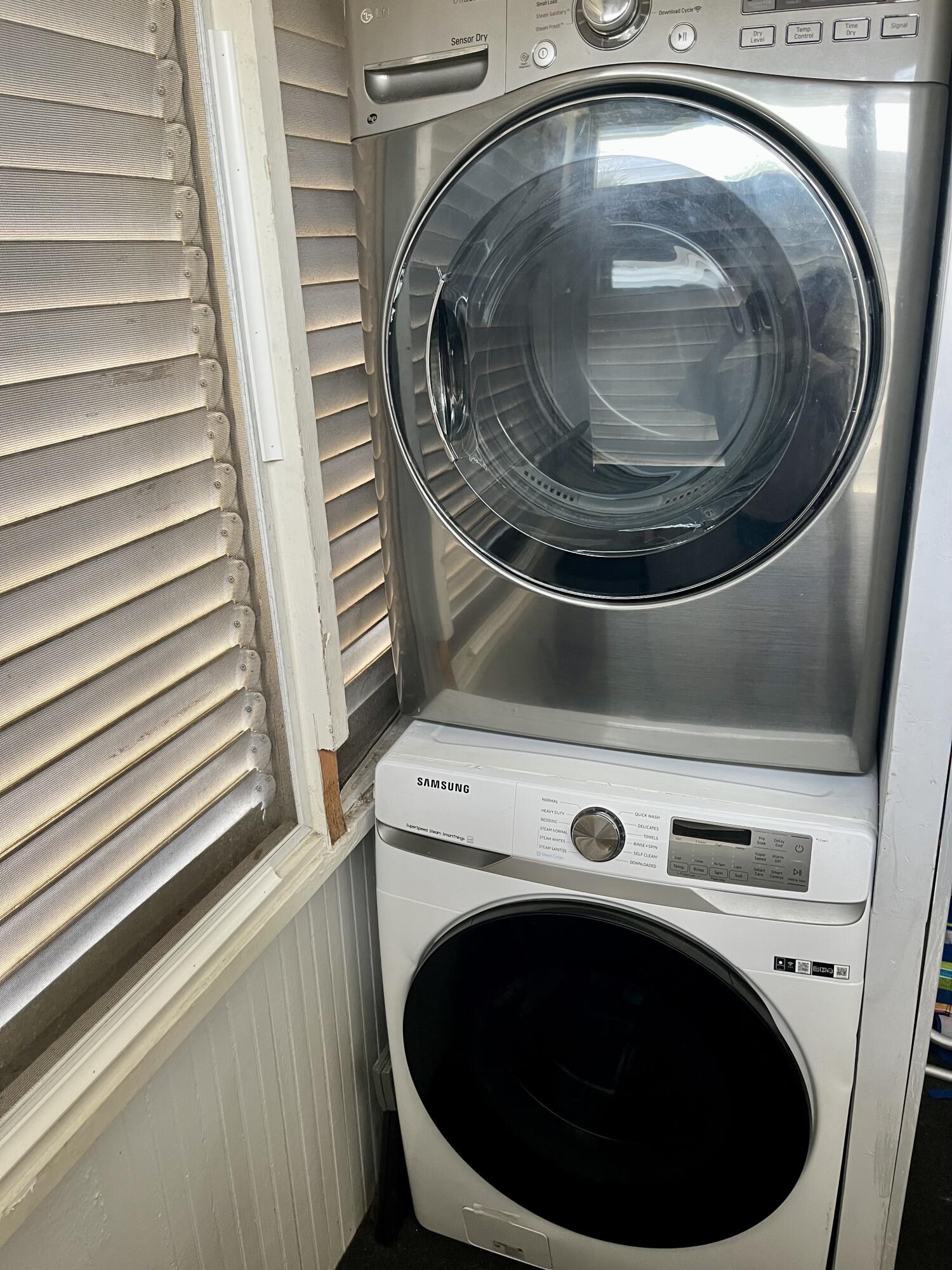 711 South N Street, Unit 1 Lake Worth Beach, FL 33460 - Photo 2 of 12 a utility room with washer and dryer