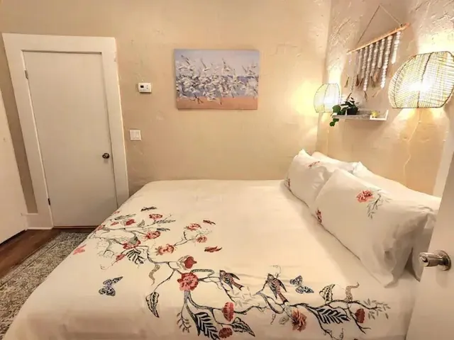 a bed room with a bed and a couch