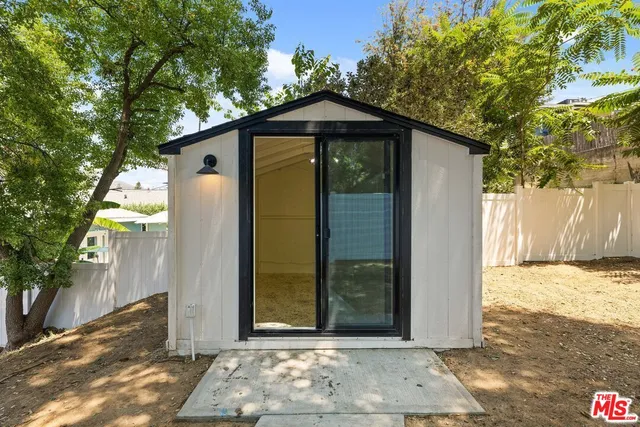 a front view of a house with shower
