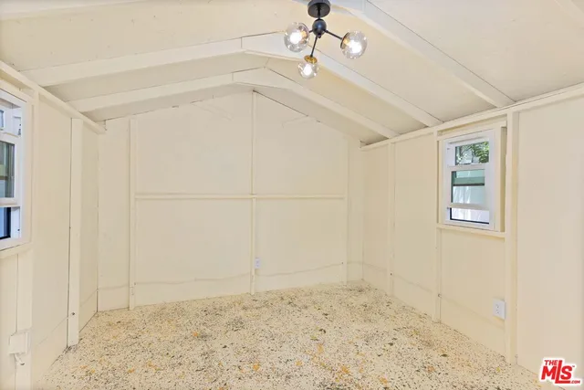 a view of a room with an empty space