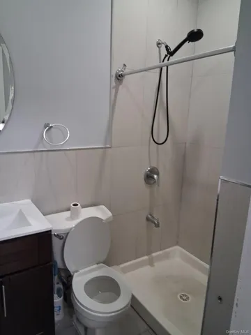a bathroom with a toilet and a sink