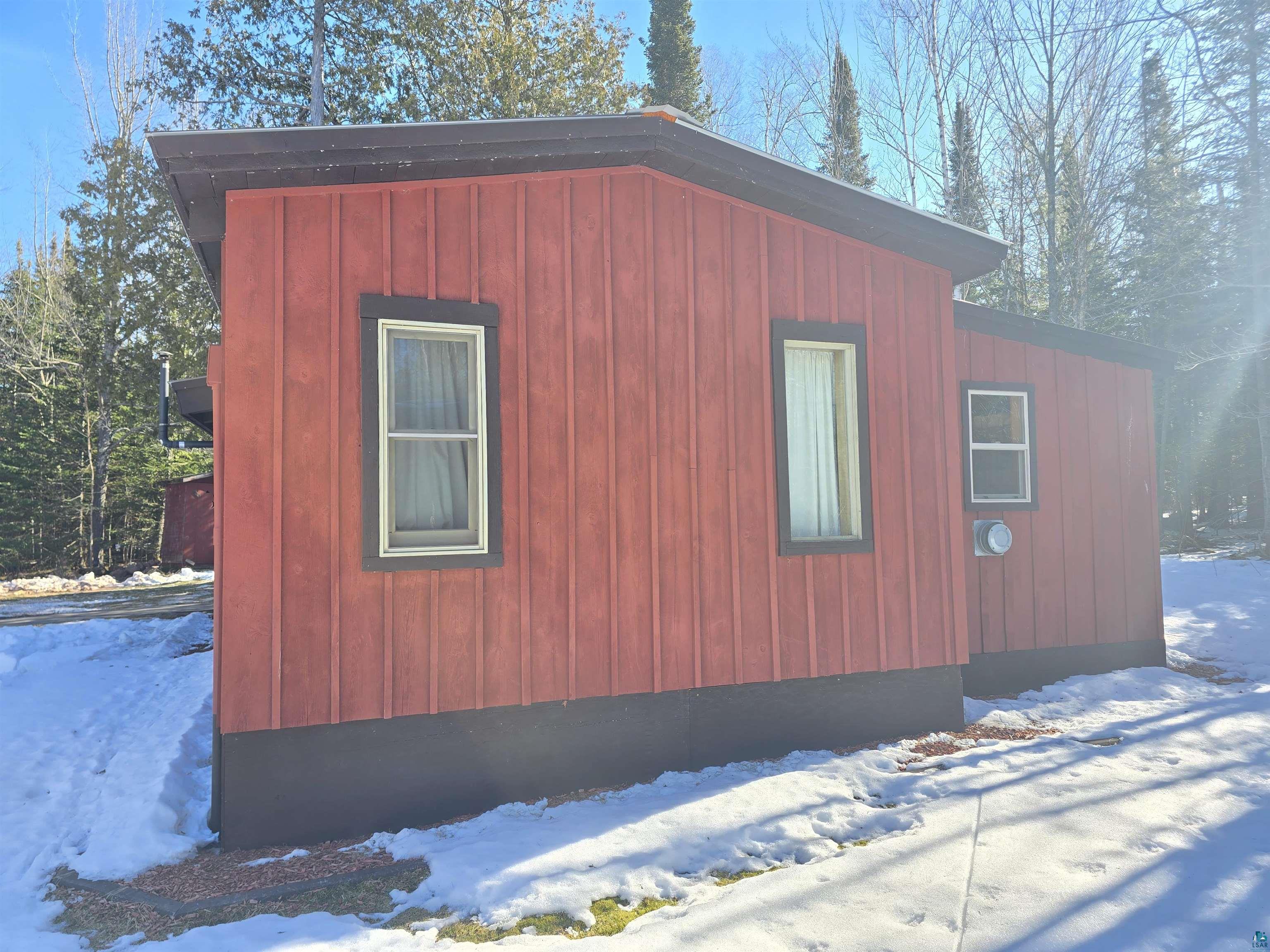 View of snow covered property