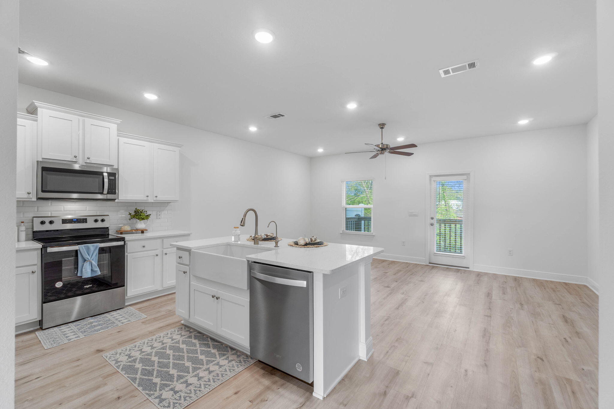 1 Renea Cove Destin, FL 32541 - Photo 11 of 51 a kitchen with a sink stainless steel appliances and cabinets