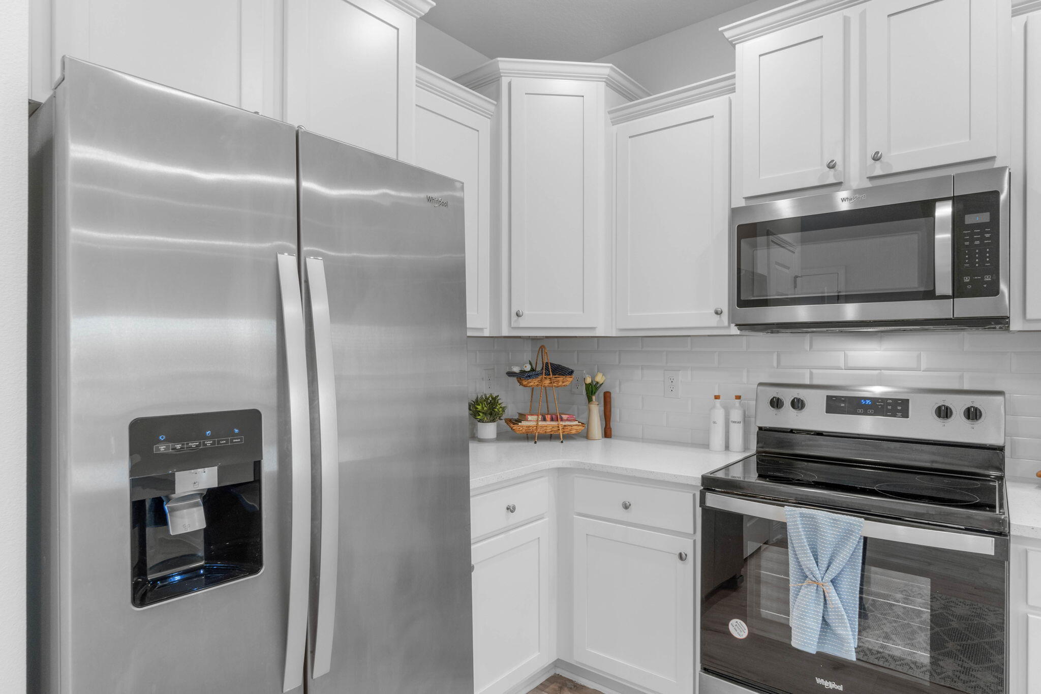 1 Renea Cove Destin, FL 32541 - Photo 15 of 51 a kitchen with stainless steel appliances granite countertop white cabinets and a refrigerator