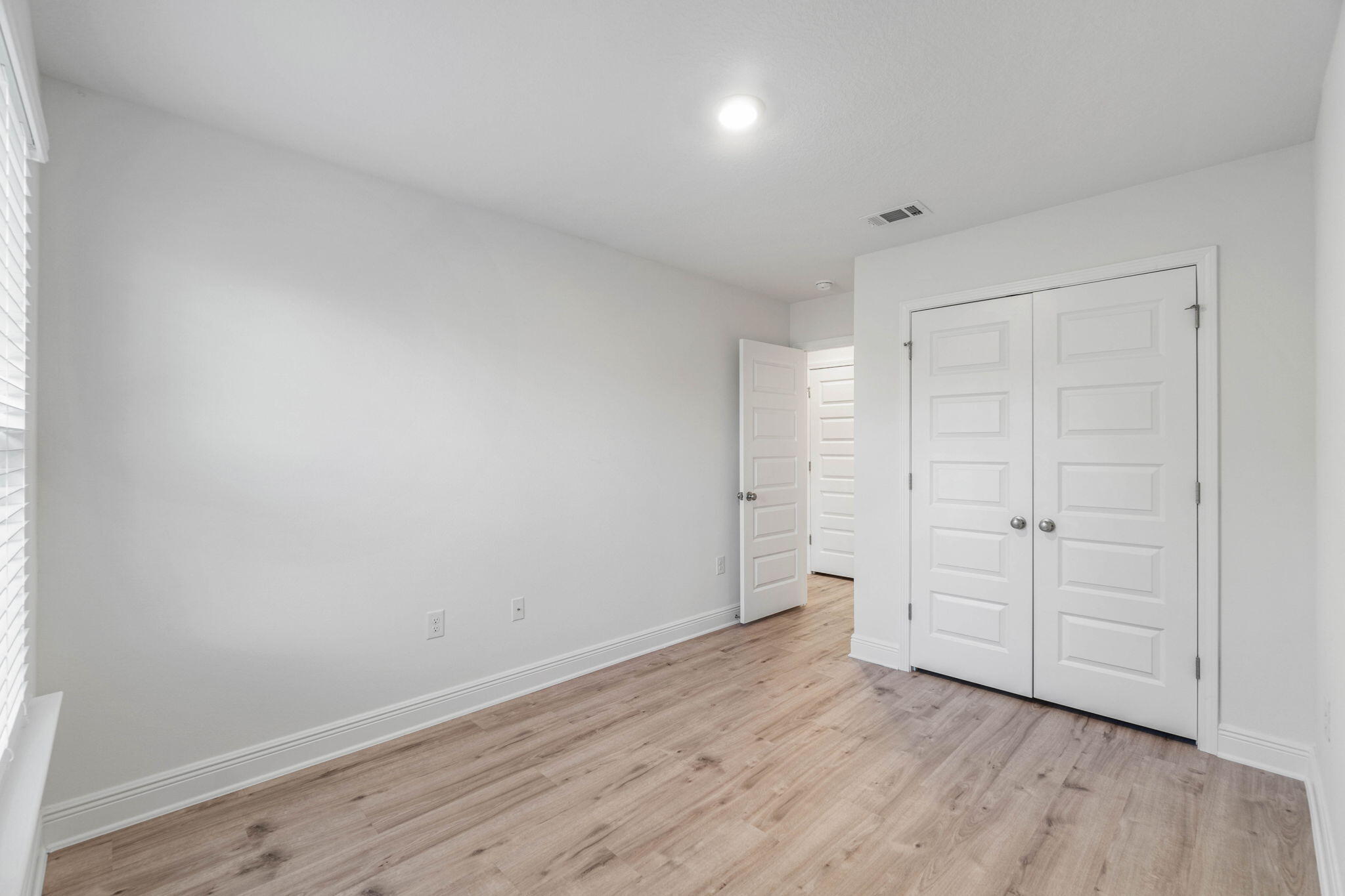 1 Renea Cove Destin, FL 32541 - Photo 30 of 51 a view of empty room with wooden floor