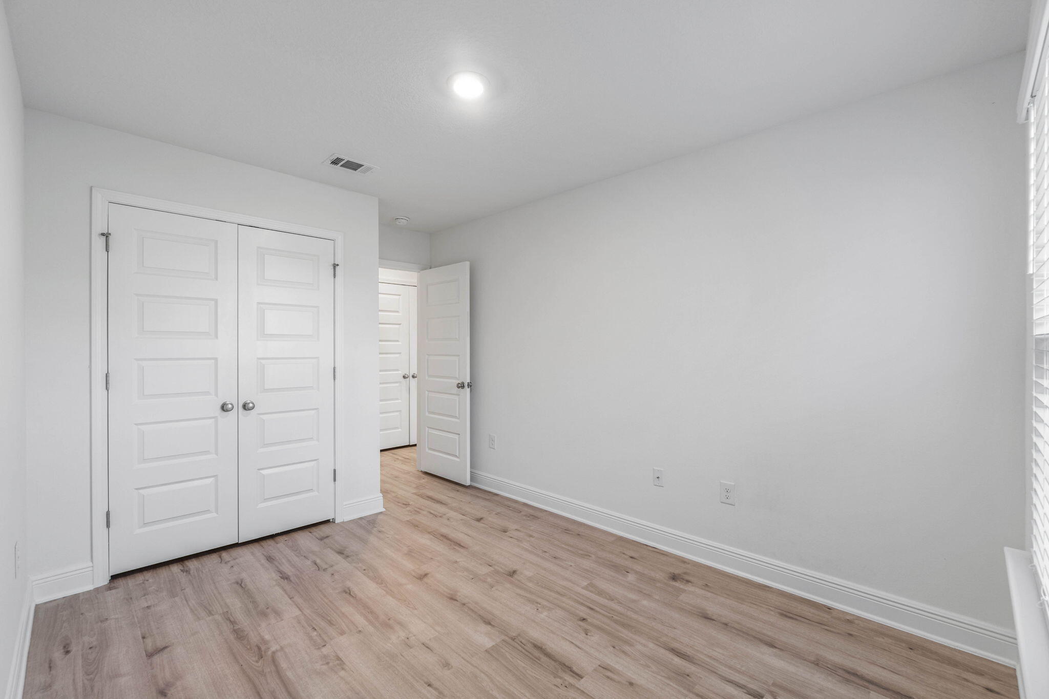 1 Renea Cove Destin, FL 32541 - Photo 32 of 51 a view of an empty room and wooden floor