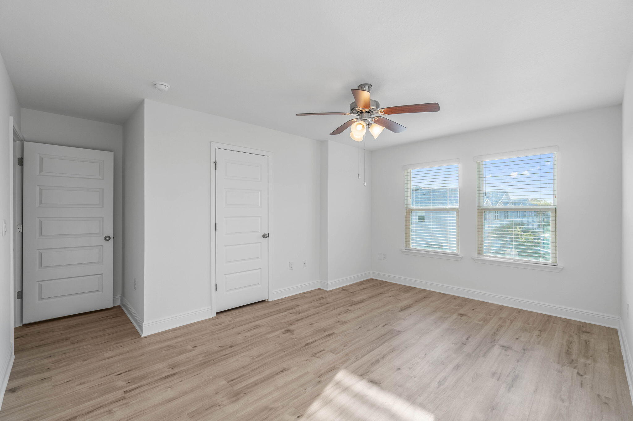 1 Renea Cove Destin, FL 32541 - Photo 35 of 51 wooden floor in an empty room with a window