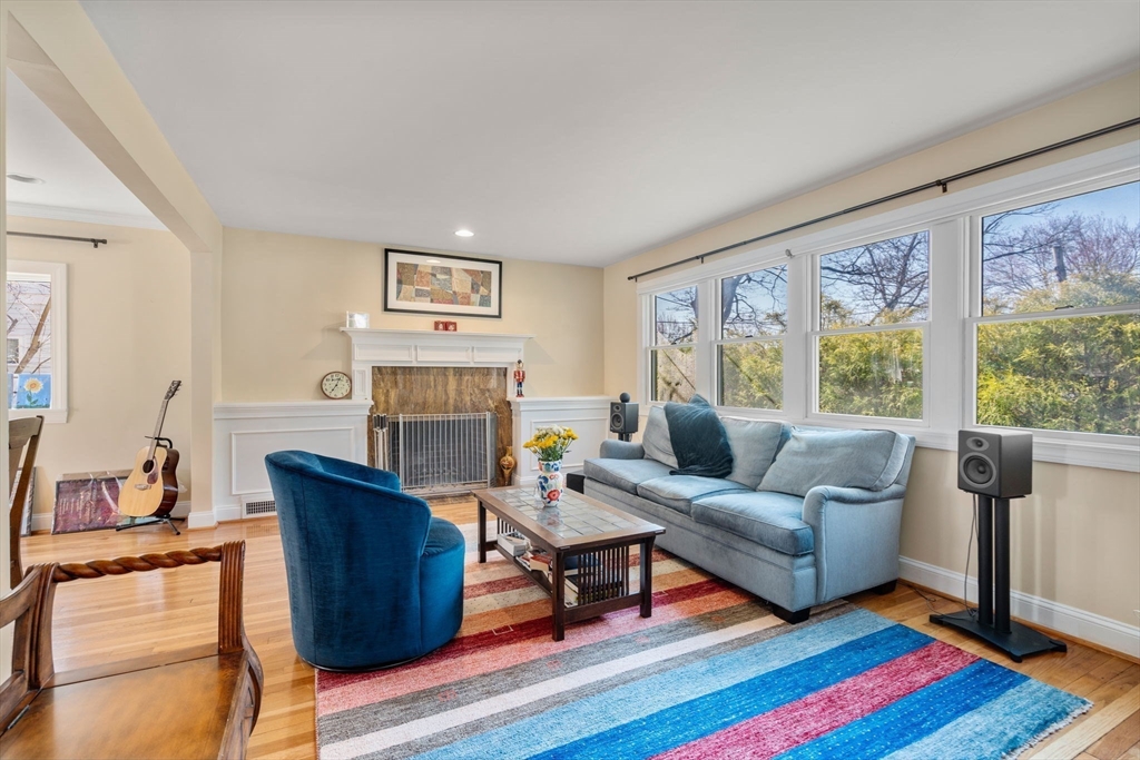 35 Kendall Road Newton, MA 02459 - Photo 3 of 20 a living room with furniture a lamp wooden floor and a large window