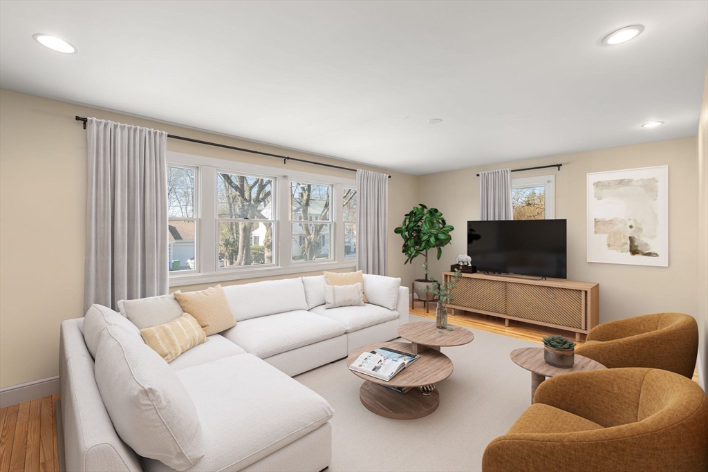 35 Kendall Road Newton, MA 02459 - Photo 7 of 20 a living room with furniture and a flat screen tv