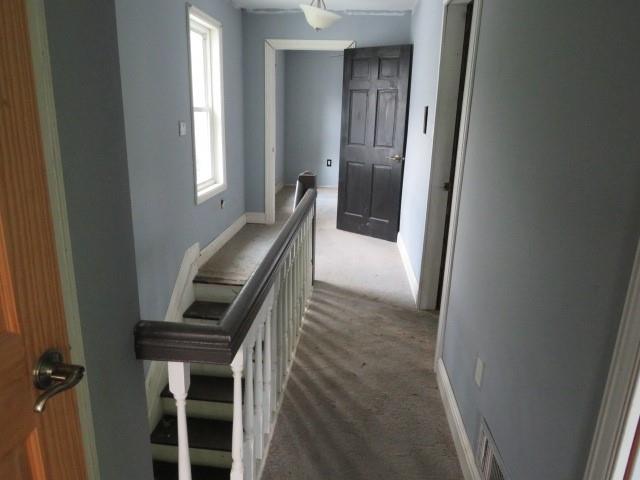 6 Morgan Street Cuddy, PA 15031 - Photo 14 of 34 a view of entryway and hall with a chair