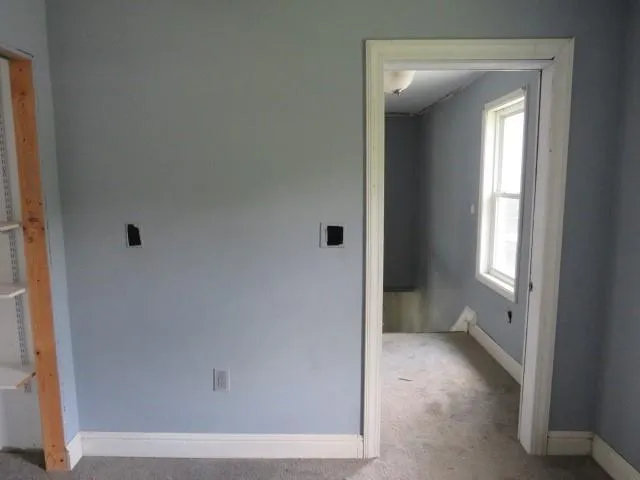 wooden floor with cabinet