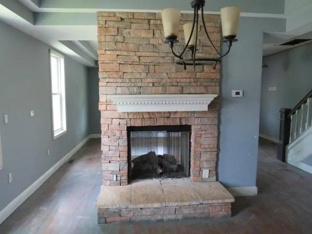 a fireplace with a clock on top of it