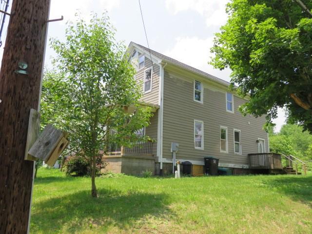 6 Morgan Street Cuddy, PA 15031 - Photo 34 of 34 a backyard of a house with lots of green space