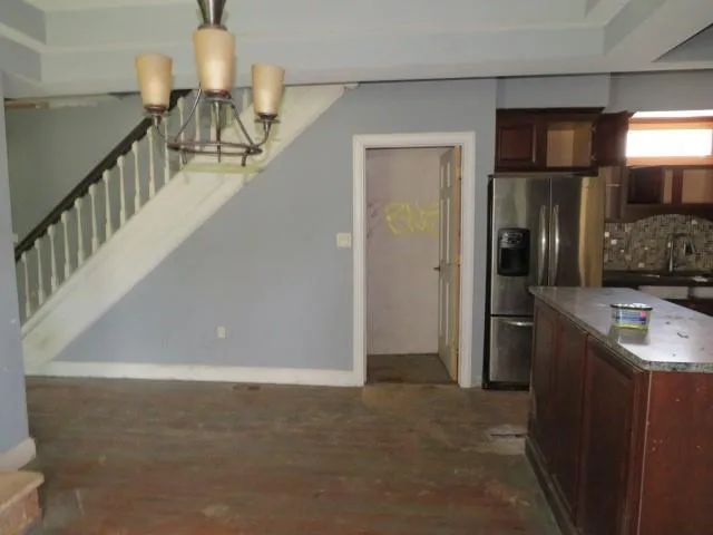 a view of hallway with washer and dryer