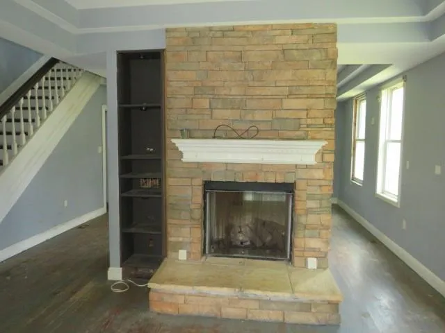 a living room with a fireplace