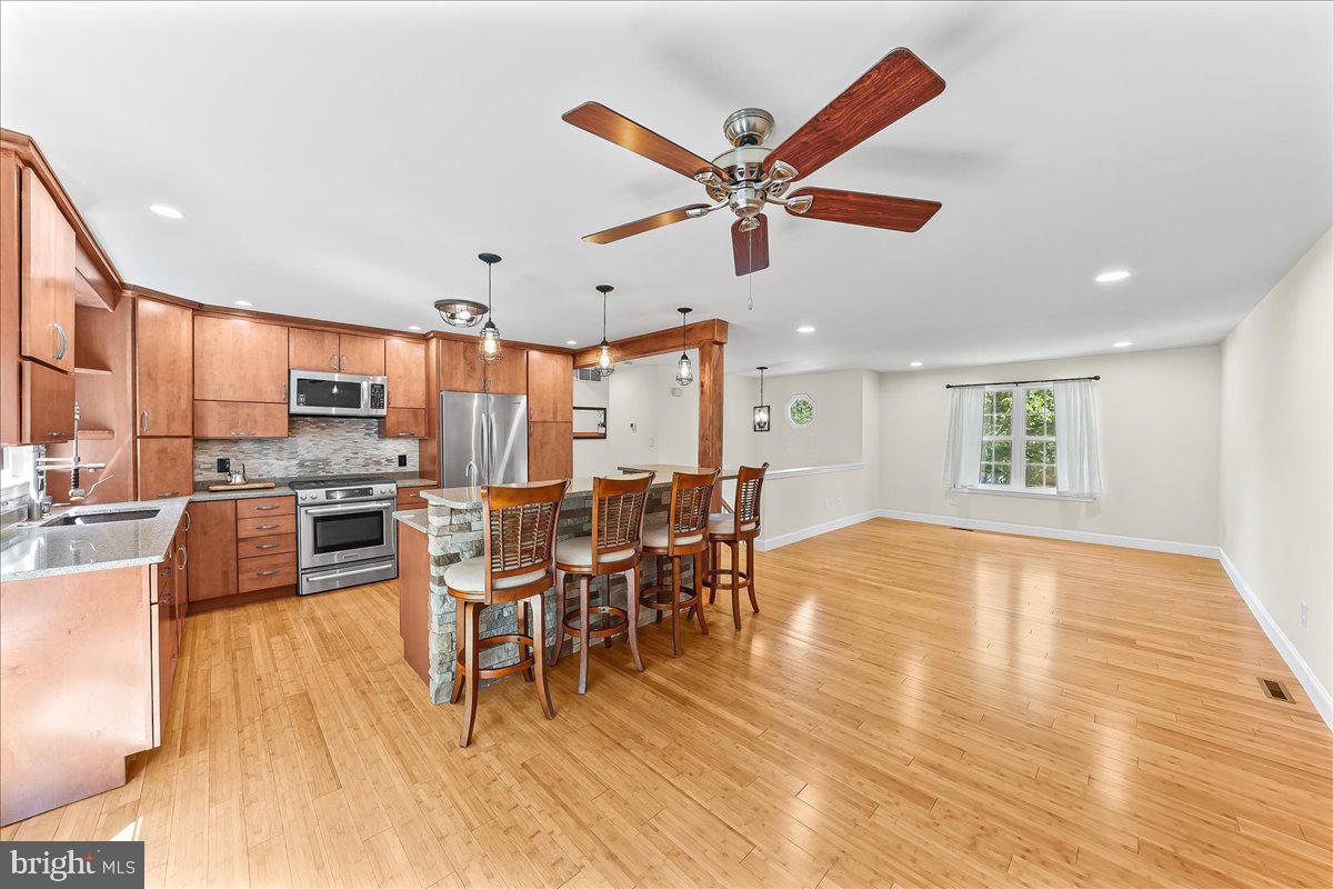 4169 Hunters Run Boulevard Reading, PA 19606 - Photo 6 of 33 Open Kitchen, Living Room/Dining Room Combo