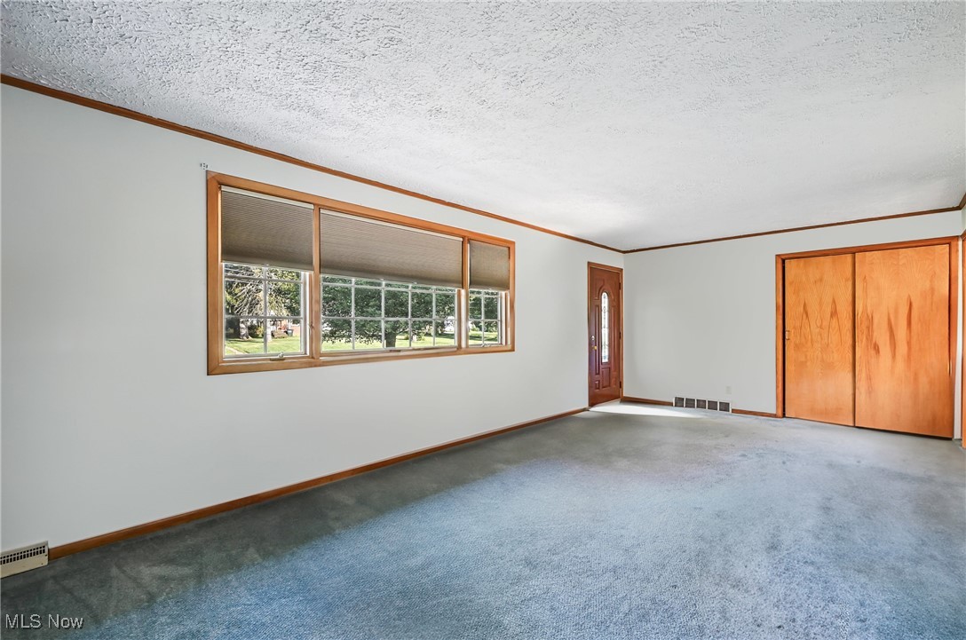 1808 Depot Road Salem, OH 44460 - Photo 11 of 50 Spacious living room. Hardwood flooring under carpet