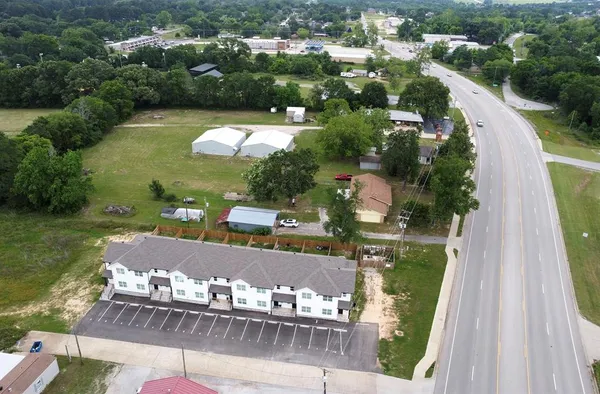 an aerial view of a house with stairs