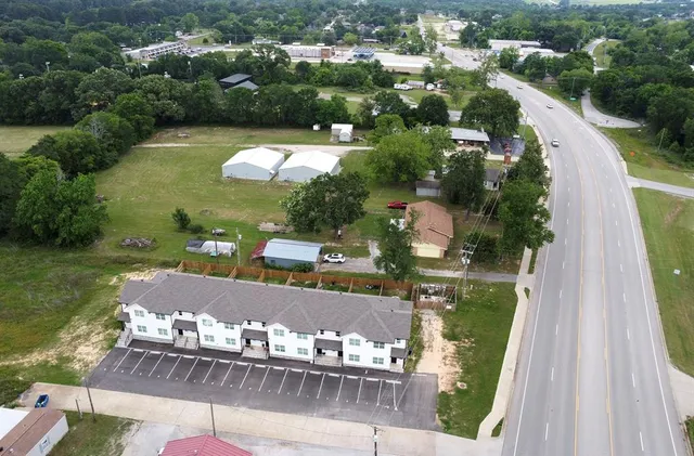 an aerial view of a house with stairs