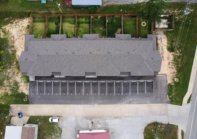 a view of a house with a small garden