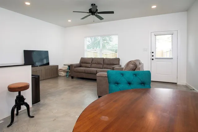 a kitchen with stainless steel appliances a sink cabinets and appliances