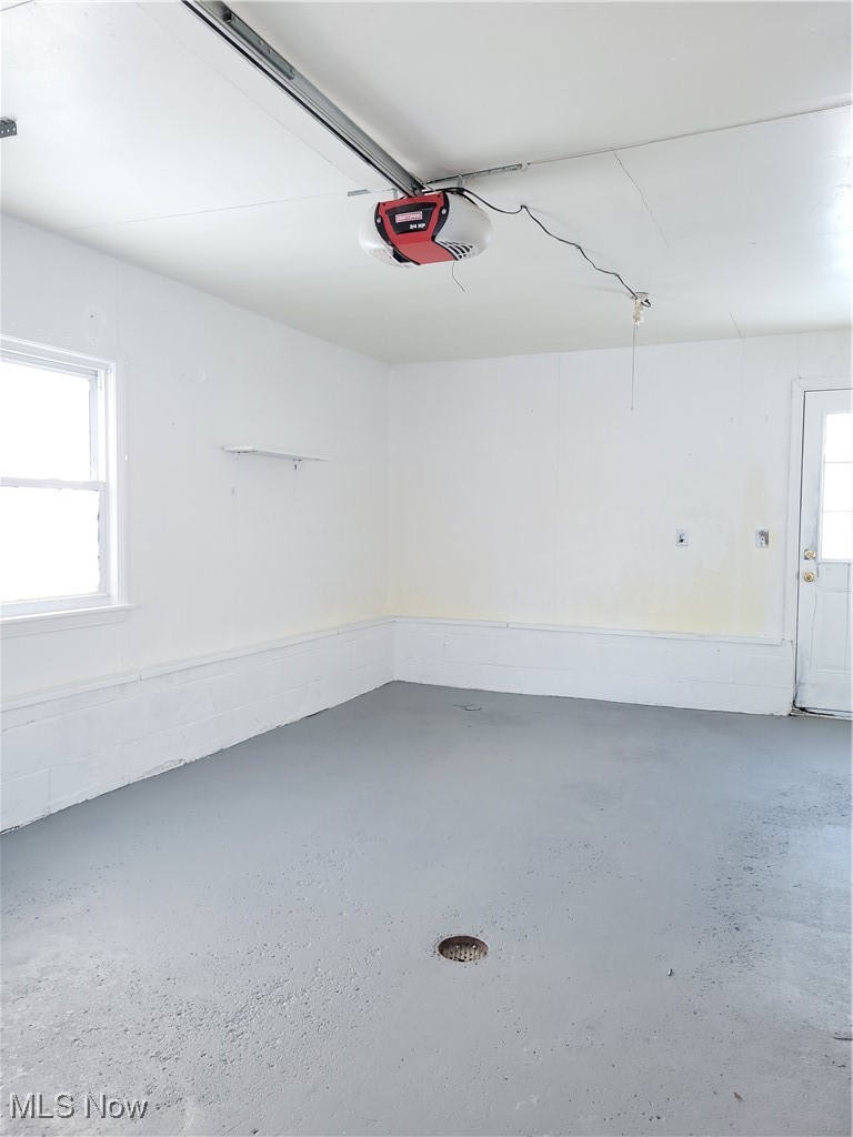 3580 Mogadore Road Mogadore, OH 44260 - Photo 6 of 29 Garage with a garage door opener