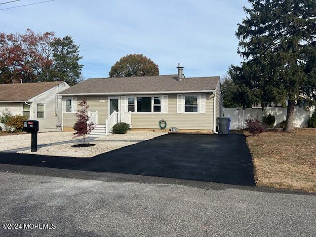 718 Pine Drive Brick, NJ 08723 - Photo 2 of 33 a front view of a house with garden