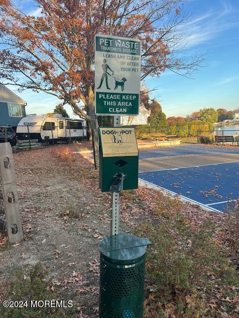718 Pine Drive Brick, NJ 08723 - Photo 24 of 33 a front view of a house with a yard