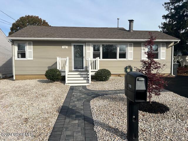 718 Pine Drive Brick, NJ 08723 - Photo 31 of 33 a front view of a house with yard