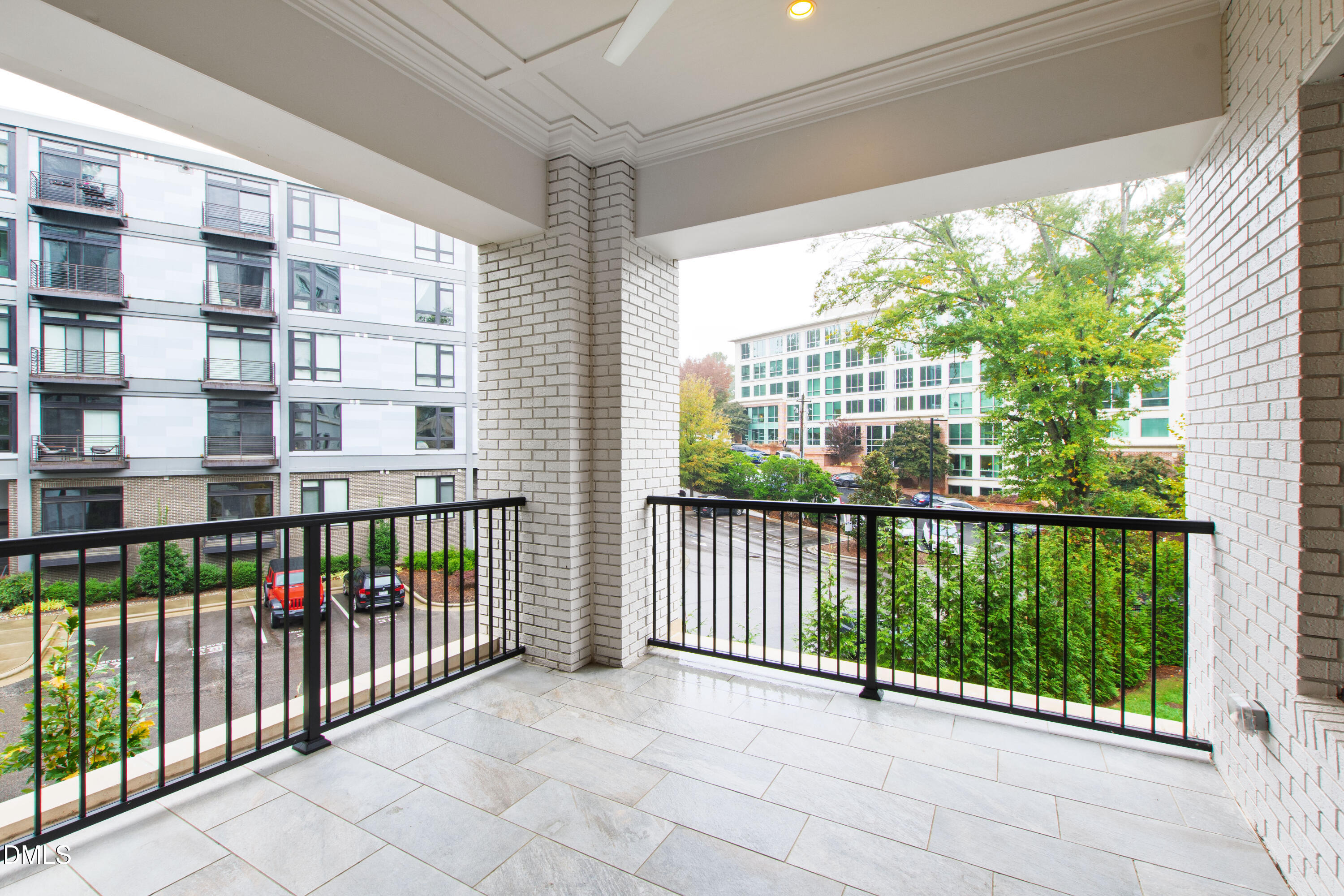 620 Wade Avenue, Unit 103 Raleigh, NC 27605 - Photo 16 of 41 a view of a balcony with floor to ceiling windows