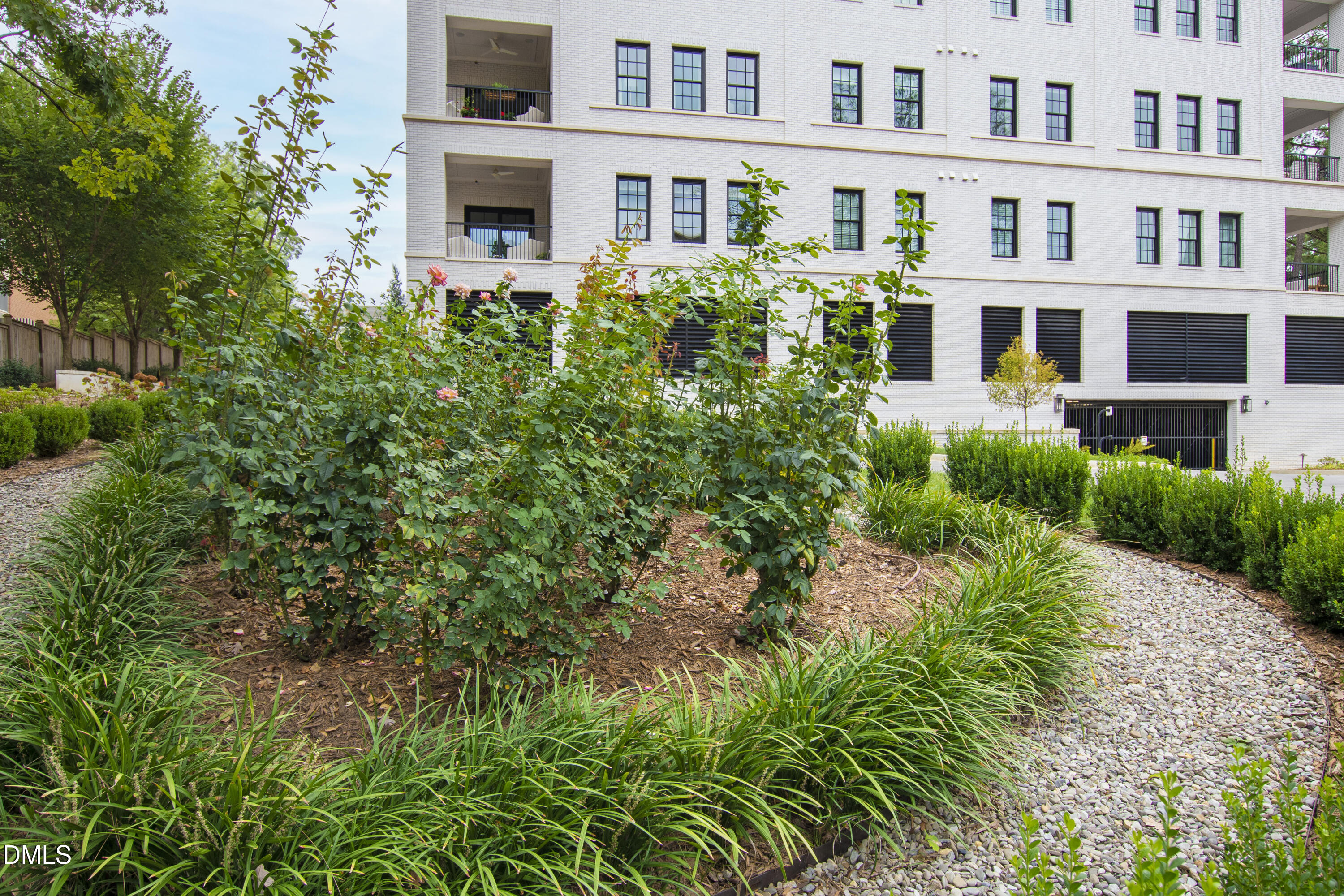 620 Wade Avenue, Unit 103 Raleigh, NC 27605 - Photo 36 of 41 a front view of multi story residential apartment building with a yard
