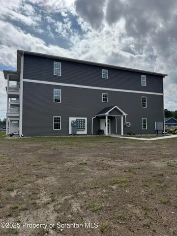 a front view of house with yard