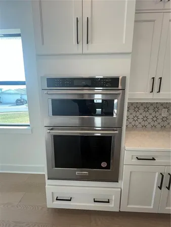 a bathroom with a sink and shower