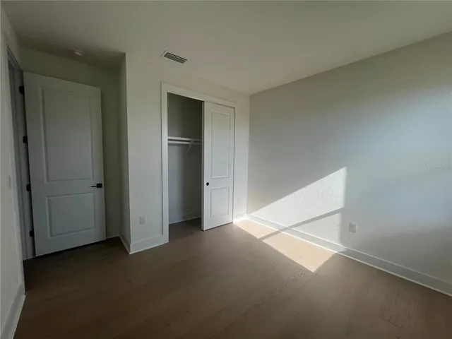 a living room with furniture a fireplace and a table