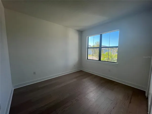 a living room with furniture or fireplace and a flat screen tv