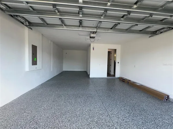 a view of a water fountain in a yard