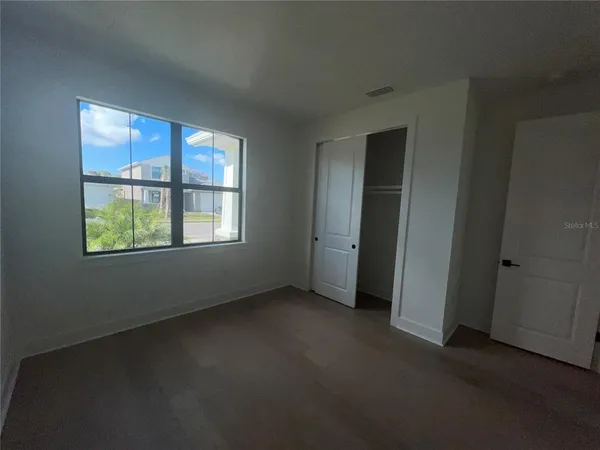a kitchen with sink and window