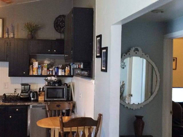115 East Madison Street Batavia, IL 60510 - Photo 13 of 23 a kitchen with stainless steel appliances granite countertop a refrigerator and a stove top oven