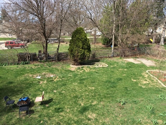 115 East Madison Street Batavia, IL 60510 - Photo 23 of 23 a backyard of a house with lots of green space