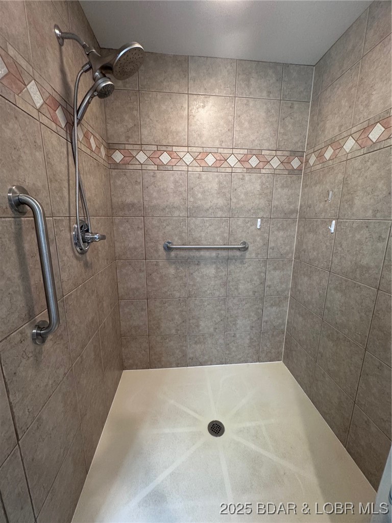 4331 Sunset Drive, Unit B Osage Beach, MO 65065 - Photo 16 of 36 Custom walk in tiled shower
