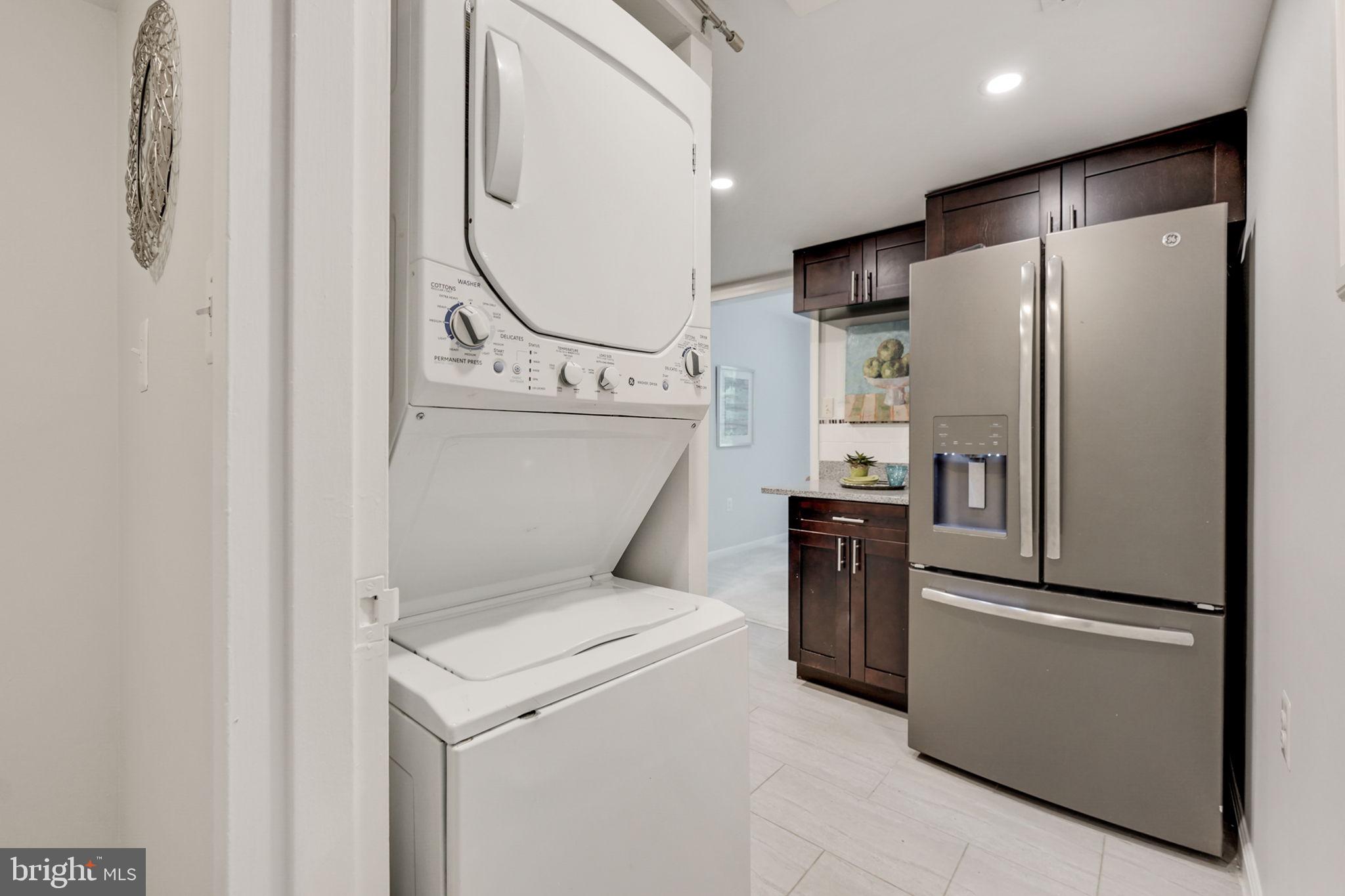 1411 Northgate Square, Unit 141112B Reston, VA 20190 - Photo 11 of 31 washer dryer in unit