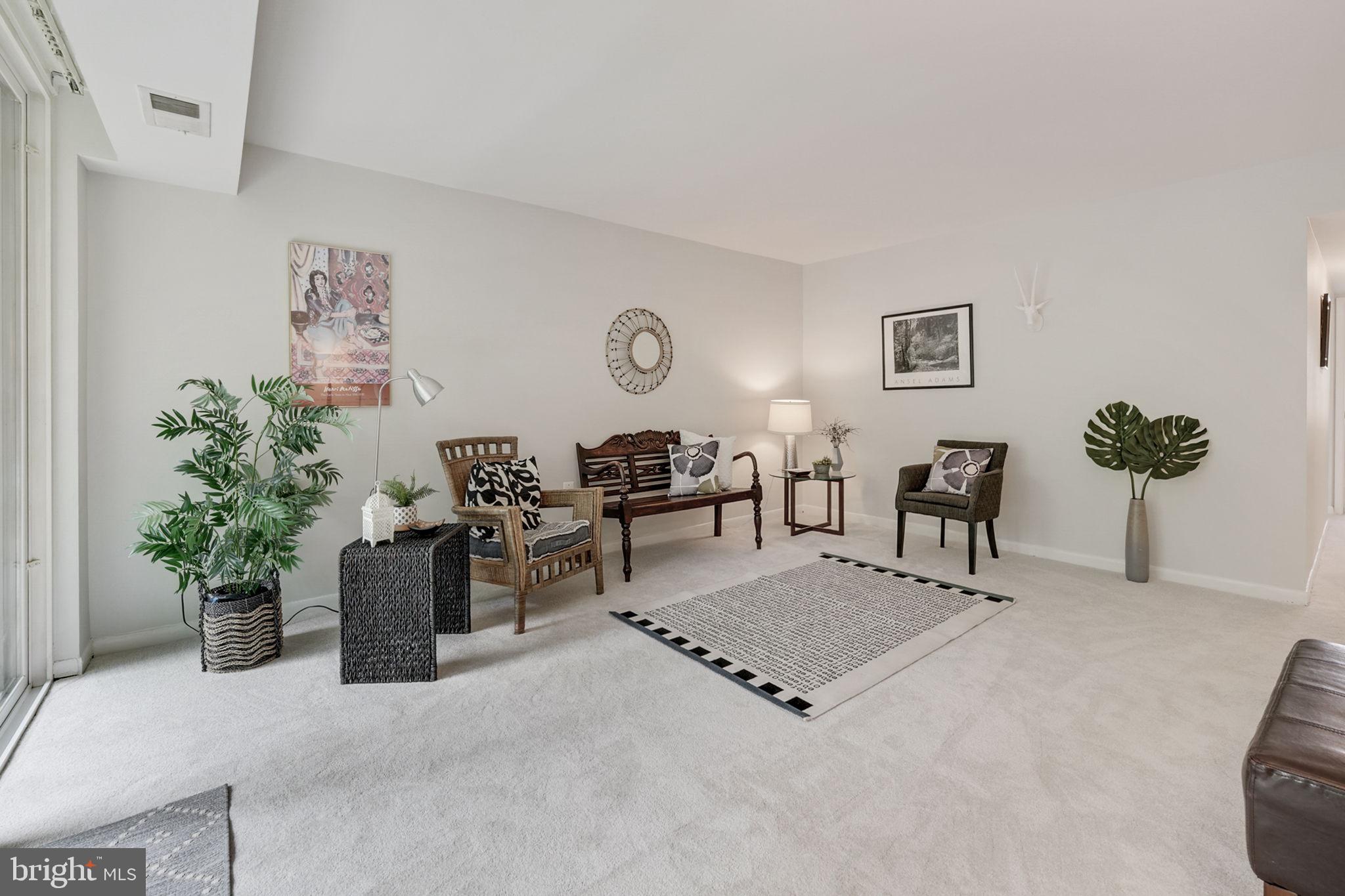 1411 Northgate Square, Unit 141112B Reston, VA 20190 - Photo 3 of 31 Open living room