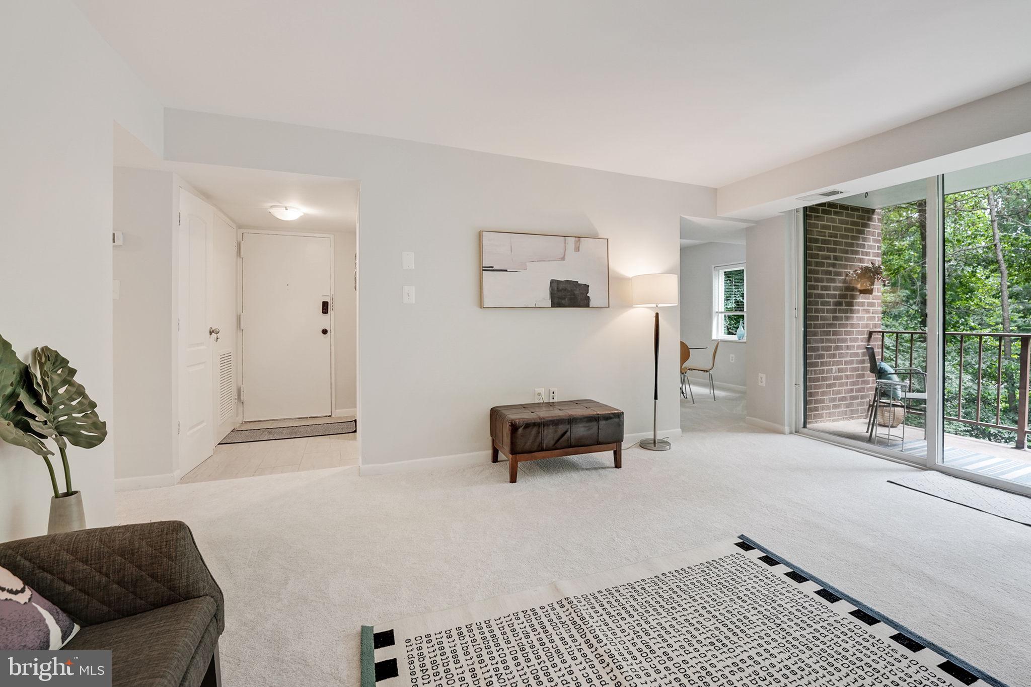 1411 Northgate Square, Unit 141112B Reston, VA 20190 - Photo 4 of 31 Living room off the foyer