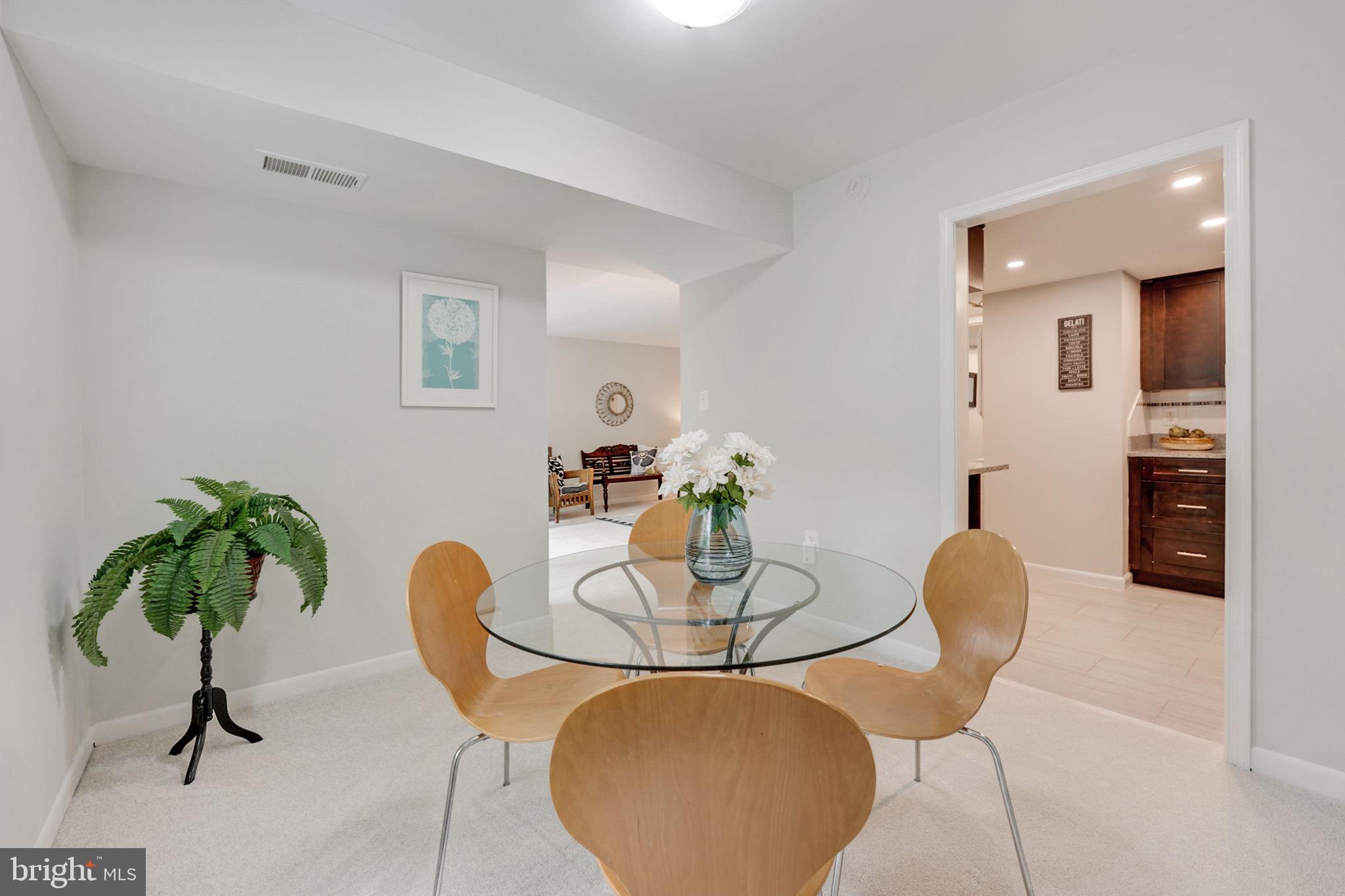 1411 Northgate Square, Unit 141112B Reston, VA 20190 - Photo 7 of 31 Dining room off the kitchen