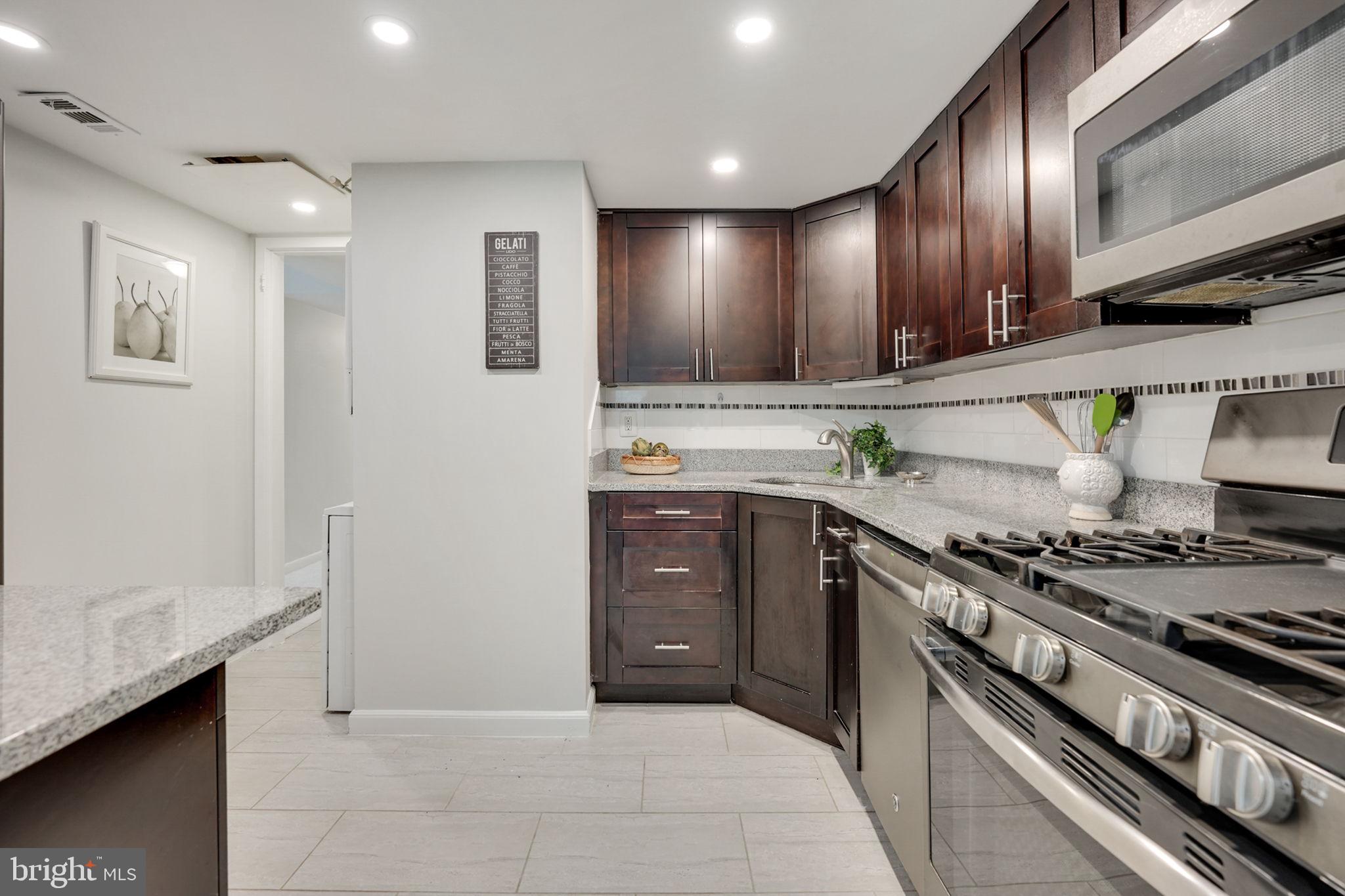 1411 Northgate Square, Unit 141112B Reston, VA 20190 - Photo 8 of 31 fully renovated kitchen