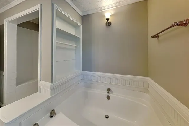 a view of a house with a yard and garage